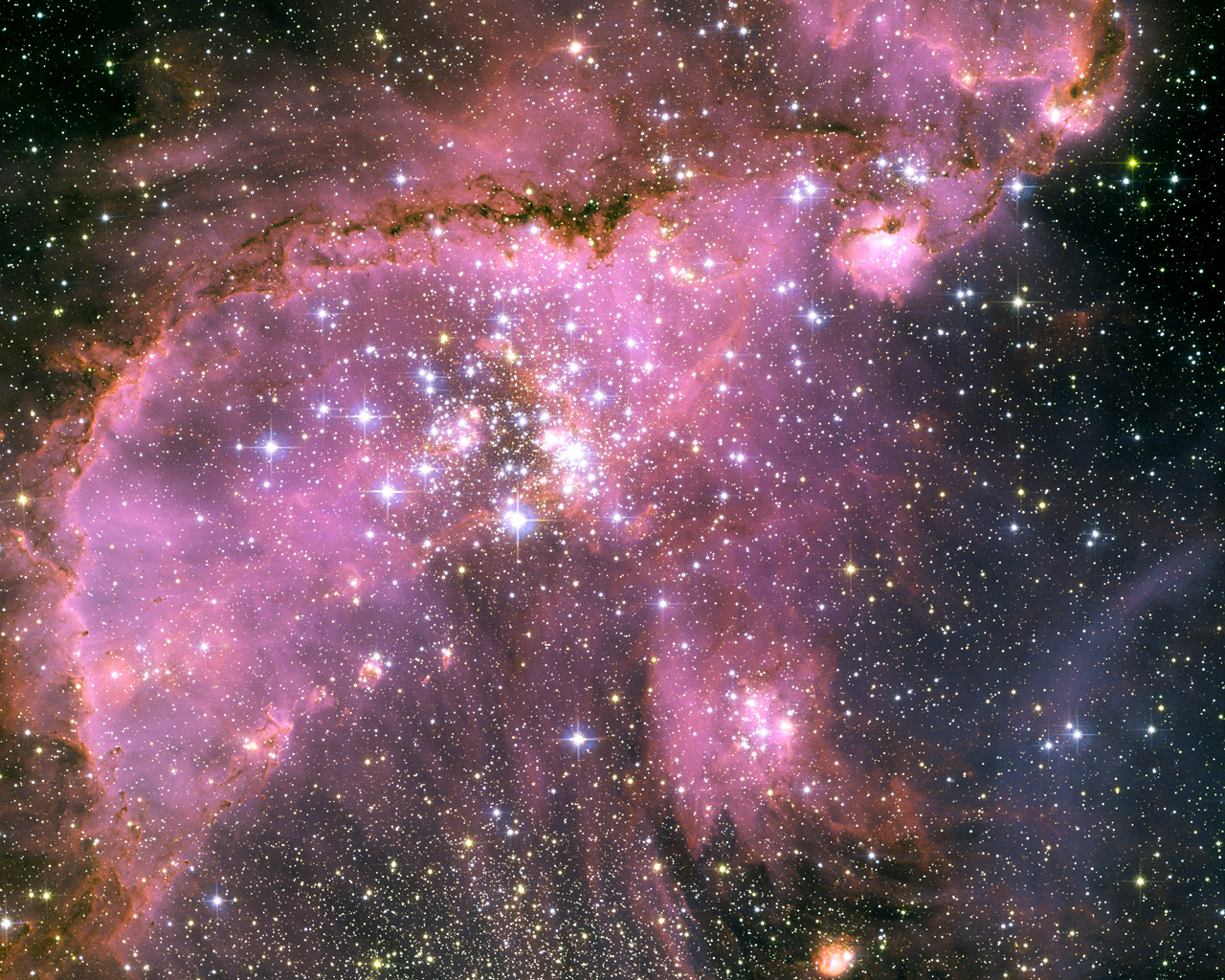 Young stars sculpt gas with powerful outflows