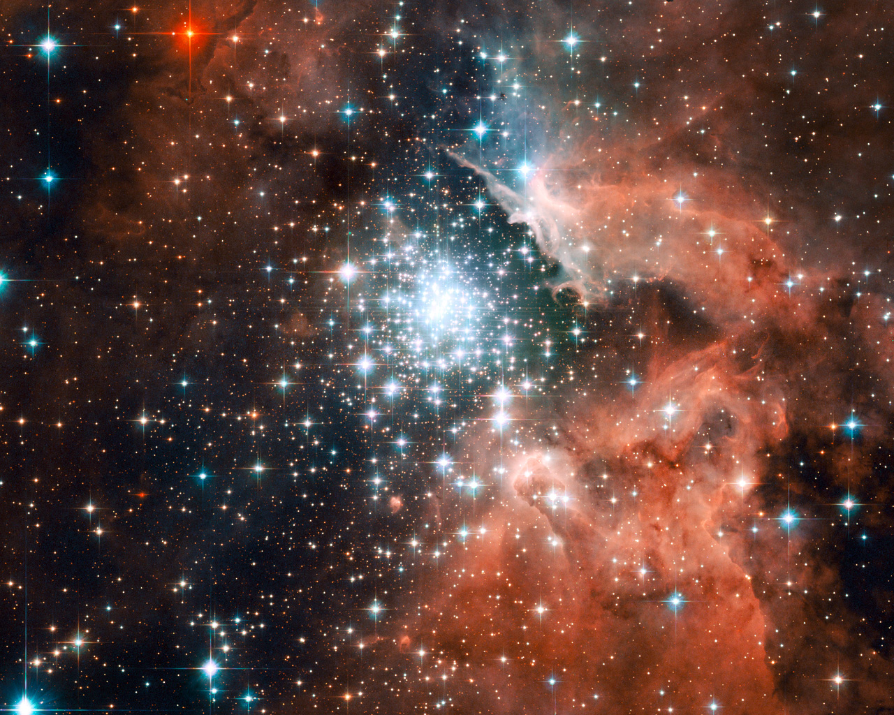 Extreme star cluster bursts into life in new Hubble image