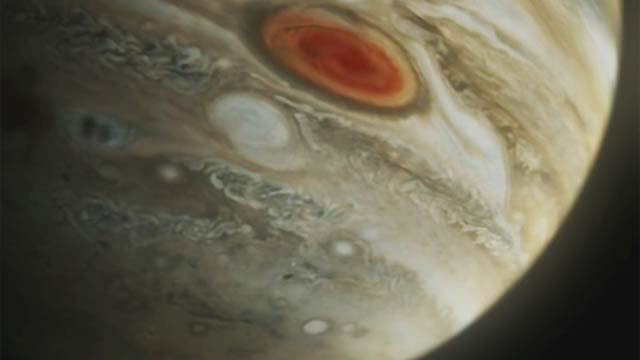 Jupiter closeup showing the Shoemaker-Levy 9 impacts