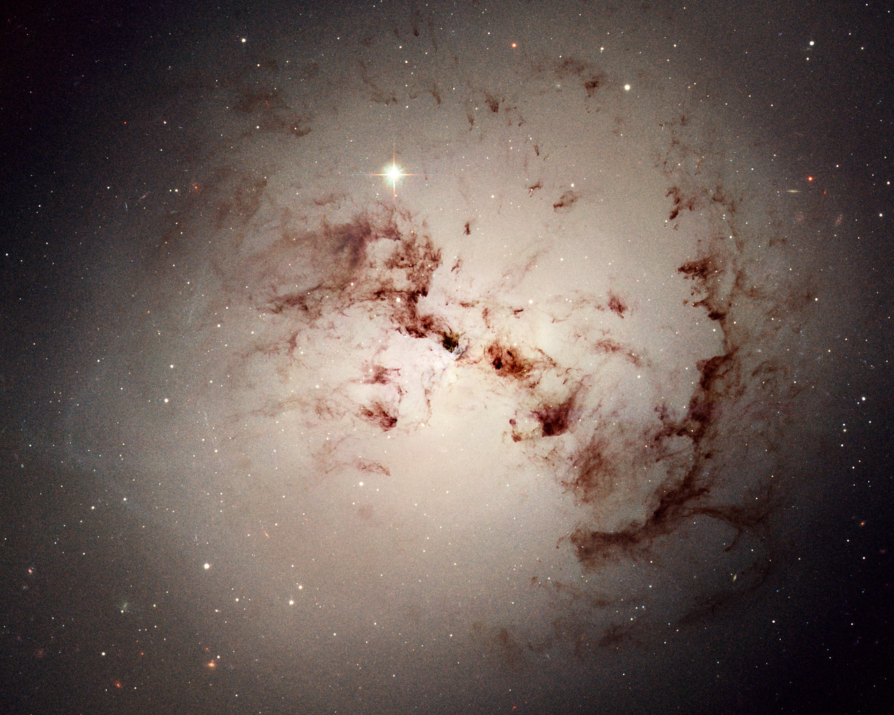 Hubble spies cosmic dust bunnies