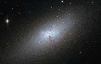 A peculiar compact blue dwarf galaxy